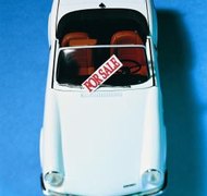 Photodisc/Photodisc/Getty Images The decedent's name must be removed from the title before you can sell his vehicle.