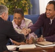 Comstock Images/Comstock/Getty Images Make sure the right person signs a corporate contract.