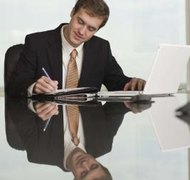 Jupiterimages/Comstock/Getty Images Online legal services can provide assistance with claim drafting.