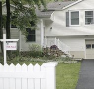 Comstock/Comstock/Getty Images Your ex-spouse's bankruptcy shouldn't affect your share of joint property.