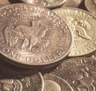 Hemera Technologies/AbleStock.com/Getty Images Spouses may incur additional fees when splitting an annuity.
