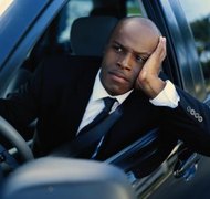 Stockbyte/Stockbyte/Getty Images Making your car payments in bankruptcy may not protect your credit rating.