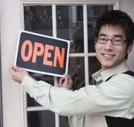 Jupiterimages/Brand X Pictures/Getty Images Starting an LLC in Maryland means filing paperwork and paying fees.