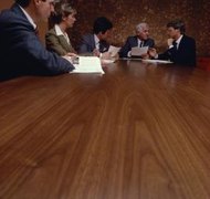 Jupiterimages/Photos.com/Getty Images Parties to a business sale can agree to keep specified information secret.