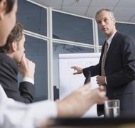 Comstock Images/Comstock/Getty Images Conversion of a business into an LLC requires planning and deliberation.