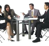 Photodisc/Photodisc/Getty Images The board of directors oversees day-to-day management of a corporation.