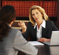 Stockbyte/Stockbyte/Getty Images It may be advisable to hire a lawyer when the family is contesting estate issues.