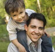 Jupiterimages/Brand X Pictures/Getty Images A father-child bond is more than biological.