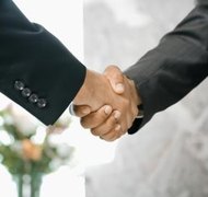 Creatas Images/Creatas/Getty Images A limited partnership offers protection against liability for limited partners.