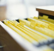 Ciaran Griffin/Stockbyte/Getty Images Divorce records are generally available to the public.