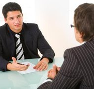 Jupiterimages/Photos.com/Getty Images An attorney may be needed to transfer assets.