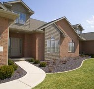 Jupiterimages/liquidlibrary/Getty Images Fairness dictates which spouse keeps the marital home in Tennessee.