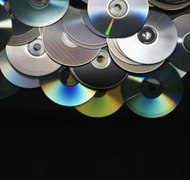 Thinkstock/Comstock/Getty Images Copying a commercial DVD without the copyright owners' permission is a crime.