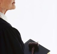 Creatas/Creatas/Getty Images A judge might scrutinize your background before granting a name change.