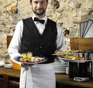 Michael Blann/Digital Vision/Getty Images A franchise restaurant may be owned by a corporation.
