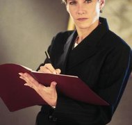 Comstock/Stockbyte/Getty Images A vocational evaluator assesses a spouse's job skills and earning potential.