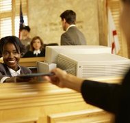 Stockbyte/Stockbyte/Getty Images File your complaint with the clerk at the Central Intake Center in D.C.