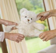 Pixland/Pixland/Getty Images An amicable divorce can minimize the stress for your children.