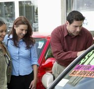 Barry Austin Photography/Photodisc/Getty Images If you wait until after your bankruptcy is discharged, you will likely find a better interest rate when purchasing a car.