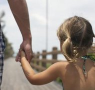 Erik Snyder/Photodisc/Getty Images Split custody separates siblings into two different family units.