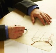 Stockbyte/Stockbyte/Getty Images You can sign over your home to an LLC or a trust.