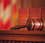 Comstock/Stockbyte/Getty Images Waivers limit the number of court appearances required for probate.