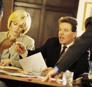 Comstock/Comstock/Getty Images Naming coagents in powers of attorney can lead to disagreements.
