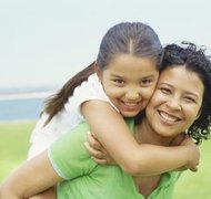 Stockbyte/Stockbyte/Getty Images Massachusetts state guidelines determine the child support amounts that parents must pay in child support.