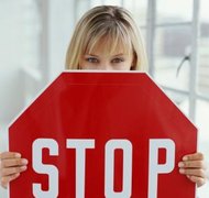 Stockbyte/Stockbyte/Getty Images The automatic stay halts lawsuits and collection actions against the debtor.