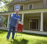 David Sacks/Photodisc/Getty Images Your responsibility ends when the mortgage is eliminated.