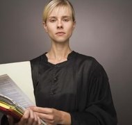 Jupiterimages/Goodshoot/Getty Images Submit a will to probate court upon the death of the decedent.