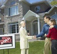 Hemera Technologies/AbleStock.com/Getty Images Power attorney often plays a role in real estate.