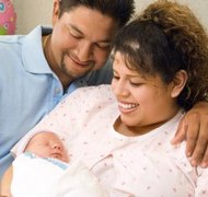 Jupiterimages/Comstock/Getty Images Parental rights to a newborn may depend on marital status.