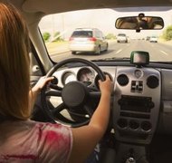 Jupiterimages/Creatas/Getty Images You cannot remove your spouse from auto insurance during the divorce.