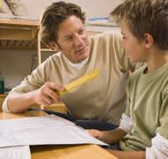 Jupiterimages/Pixland/Getty Images Arkansas takes a percentage of your pay for your children's support.