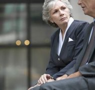 Hemera Technologies/AbleStock.com/Getty Images A spouse can leave his part of the marital property to a friend or stranger.