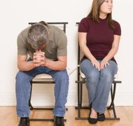 Jupiterimages/Creatas/Getty Images A spouse may face jail time if he hides funds during a divorce.