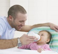 Jupiterimages/Brand X Pictures/Getty Images Divorce can limit your time with your newborn, but it will not eliminate your time with her.
