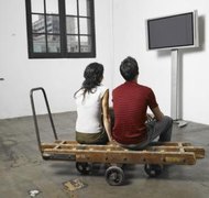 Michael Blann/Photodisc/Getty Images Couples may not file for joint bankruptcy after a divorce is final.