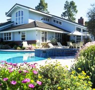 Brand X Pictures/Brand X Pictures/Getty Images Mortgaged property in an irrevocable trust may be foreclosed.