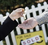Comstock/Stockbyte/Getty Images Sale is often the easiest way to separate a couple's interest in real estate.