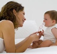 Pixland/Pixland/Getty Images Custody battles include establishing custody and child support.