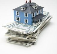 Creatas/Creatas/Getty Images In a divorce agreement, you can decide to split the house and mortgage in a variety of ways.