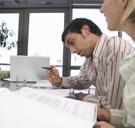 John Rowley/Digital Vision/Getty Images Mediation can help ease tensions over a loved one's will.