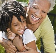 Jupiterimages/Comstock/Getty Images Grandparents may provide for their grandchildren by creating a testamentary trust.