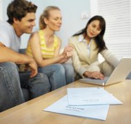 Stockbyte/Stockbyte/Getty Images Placing property in an LLC may protect your personal assets.