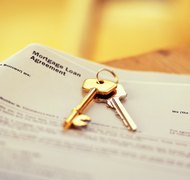 Hemera Technologies/AbleStock.com/Getty Images A power of attorney may allow a mortgage to be assumed.