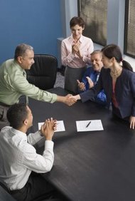 Jupiterimages/Comstock/Getty Images An LLC is a hybrid business entity combining the pass-through ability of a partnership with the limited liability features of a corporation.