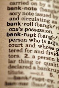 Jupiterimages/Photos.com/Getty Images Filing for bankruptcy automatically stays a lawsuit seeking to collect a debt.