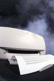 Hemera Technologies/Photos.com/Getty Images Antes de elegir una impresora para tu negocio, primero debes determinar el tipo de tinta que mejor se ajuste a tus necesidades.